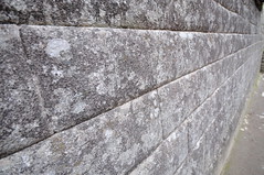 masonry carefully cut and regularly shaped blocks of stone used in construction, fitted together w/o mortar.