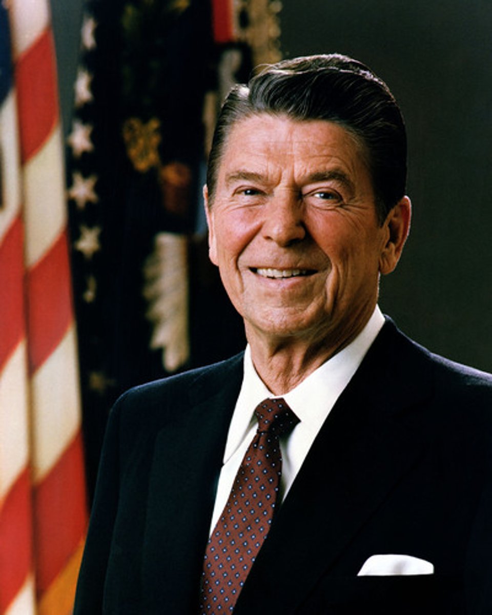 <p>President of the USA from 1981 to 1989; renewed arms race with the USSR; implemented a massive tax cut for the rich; promoted free market policies and deregulation of businesses</p>