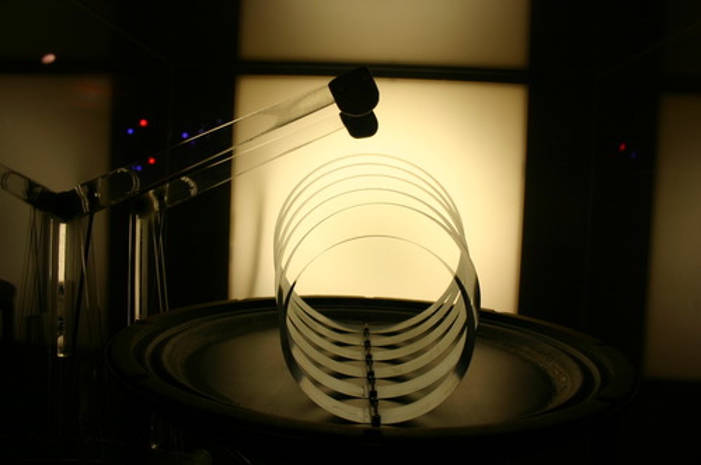 <p>the amplication of sound by increasing the force of its vibration (when a plucked guitar string causes the entire body of the guitar to move)</p>