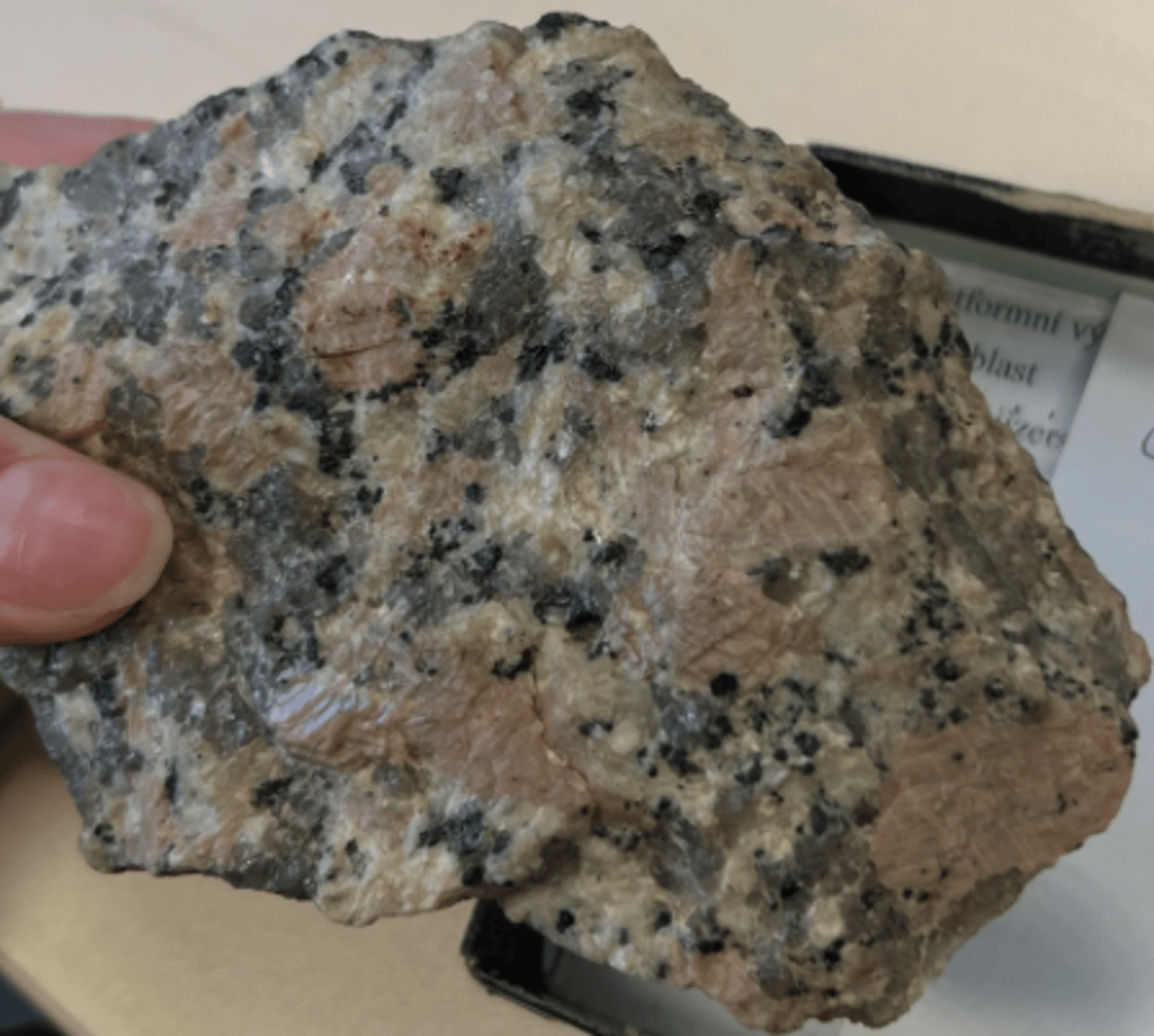 <p>intrusive igneous rock, felsic<br>essential minerals: quartz, feldspar and minor parts of mica<br>texture is phaneritic <br>Durable, strong, unique and hard</p>