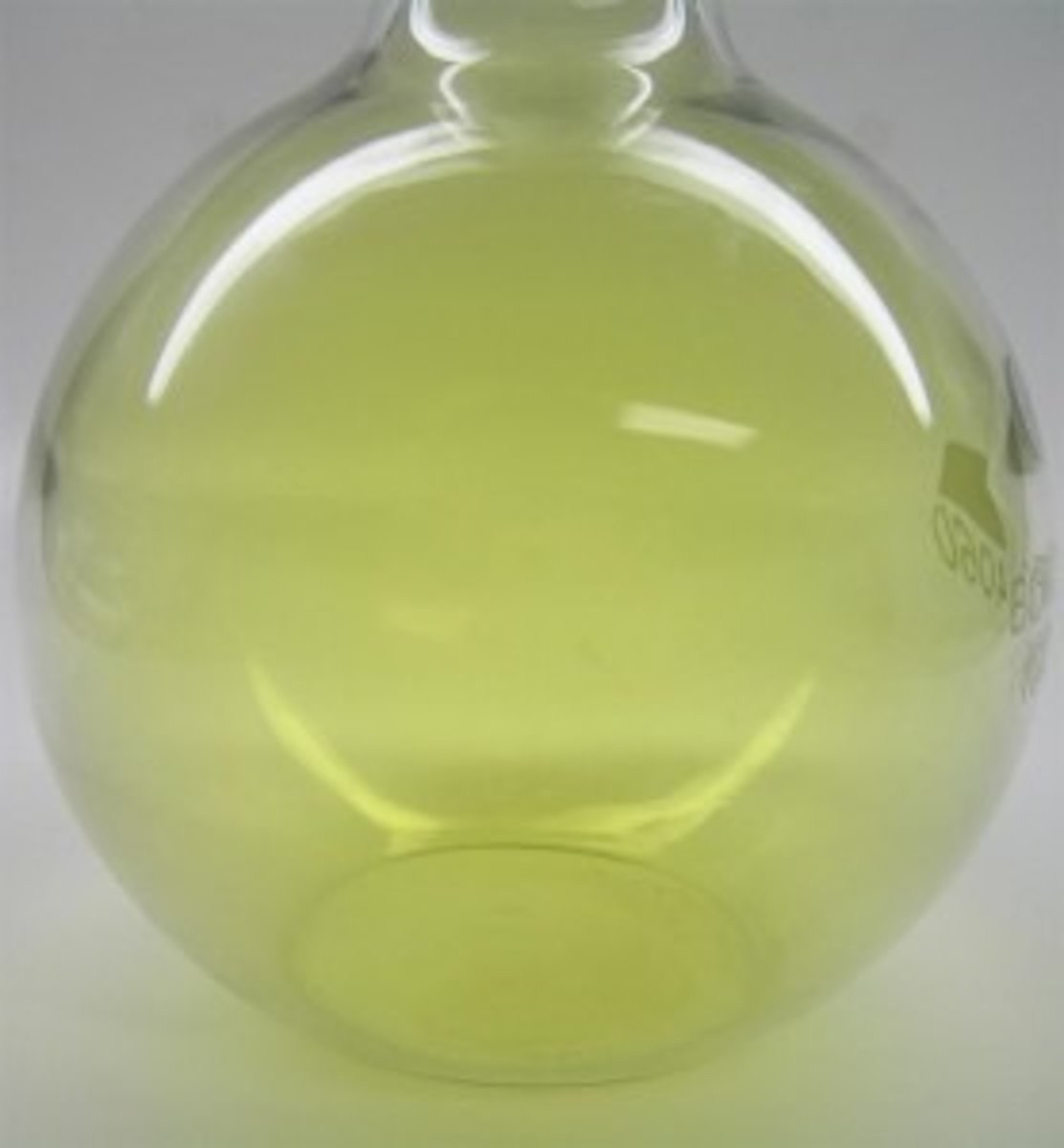 <p>An amber liquid that turns to a green gas at room temperature</p>