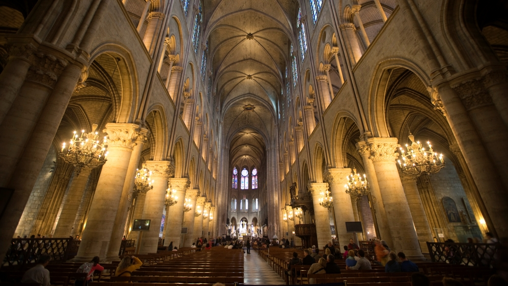 <ul><li><p>c. 1163-1250, Notre Dame de Paris took nearly 100 years to complete</p></li><li><p>symbol of theological worldly power. Was the tallest gothic cathedral of its time.</p></li><li><p>Flying buttresses to take pressure off the building, the naive is a long narrow space made of stone walls and stained glass windows.</p></li></ul>