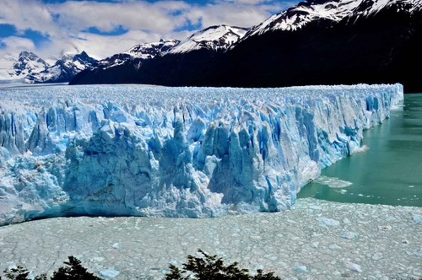 <p>a slowly moving mass or river of ice formed by the accumulation and compaction of snow on mountains or near the poles</p>