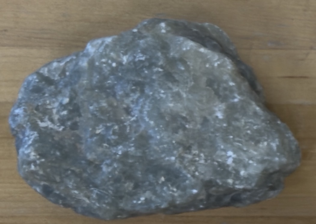 <p>More olive green, feels soapy/greasy, uneven </p>