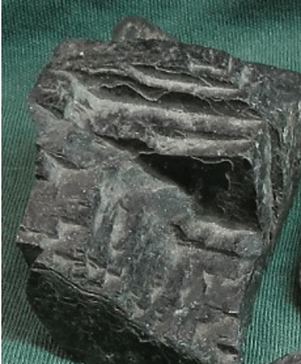 <p>Mafic Mineral (dark in color and high density) <br>high concentrations of some combination of iron, magnesium, calcium, and titanium. They tend to have low concentrations of silica, sodium, aluminum, and potassium</p>