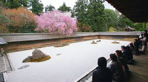 <p>“Ryoan-ji” 1450; Japan; Buddhist</p><p>Peaceful Dragon</p><ul><li><p>opposing forces (rock &amp; water)</p><ul><li><p>opposites represent yin &amp; yang</p></li></ul></li></ul><p>Chinese pagoda</p><p>Zen Buddhist - active meditation, appeals to warrior class now in power</p><ul><li><p>takes mind off negative energy</p></li></ul><p></p><p>RYOAN-JI ROCK GARDNE</p><p>Rocks = islands on water, mountains breaking through clouds, tiger carrying cubs</p><p>Unable to see all rocks from a single viewpoint → cannot comprehend entirety of universe UNLESS you have achieved FORMLESSNESS/NIRVANA</p><p>Ryoan-ji Temple - Wet Garden</p><ul><li><p>references chinese paintings (mntn. water)</p></li></ul><p></p>