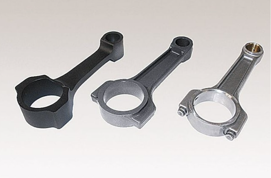 The automotive connecting rods pictured were created using a special hot forging process that results in virtually zero waste. What is it called?