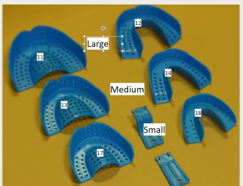 <p>taking an imprint of the teeth using a sheet of wax </p>