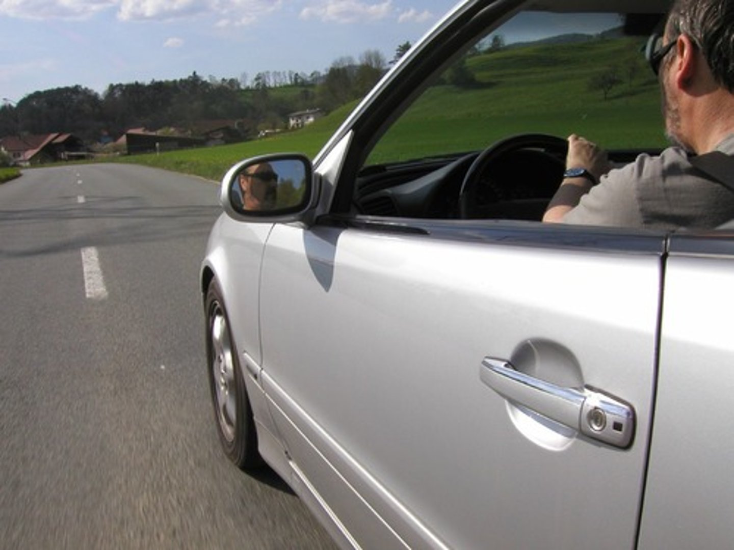 <p>he/she drives/ is driving/ is going</p>
