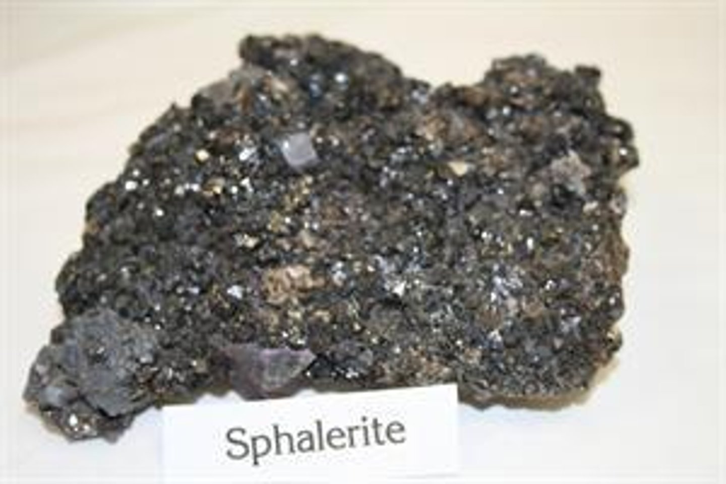 <p>Almost any color, but usually yellowish, tan, or reddish, resinous luster.</p>