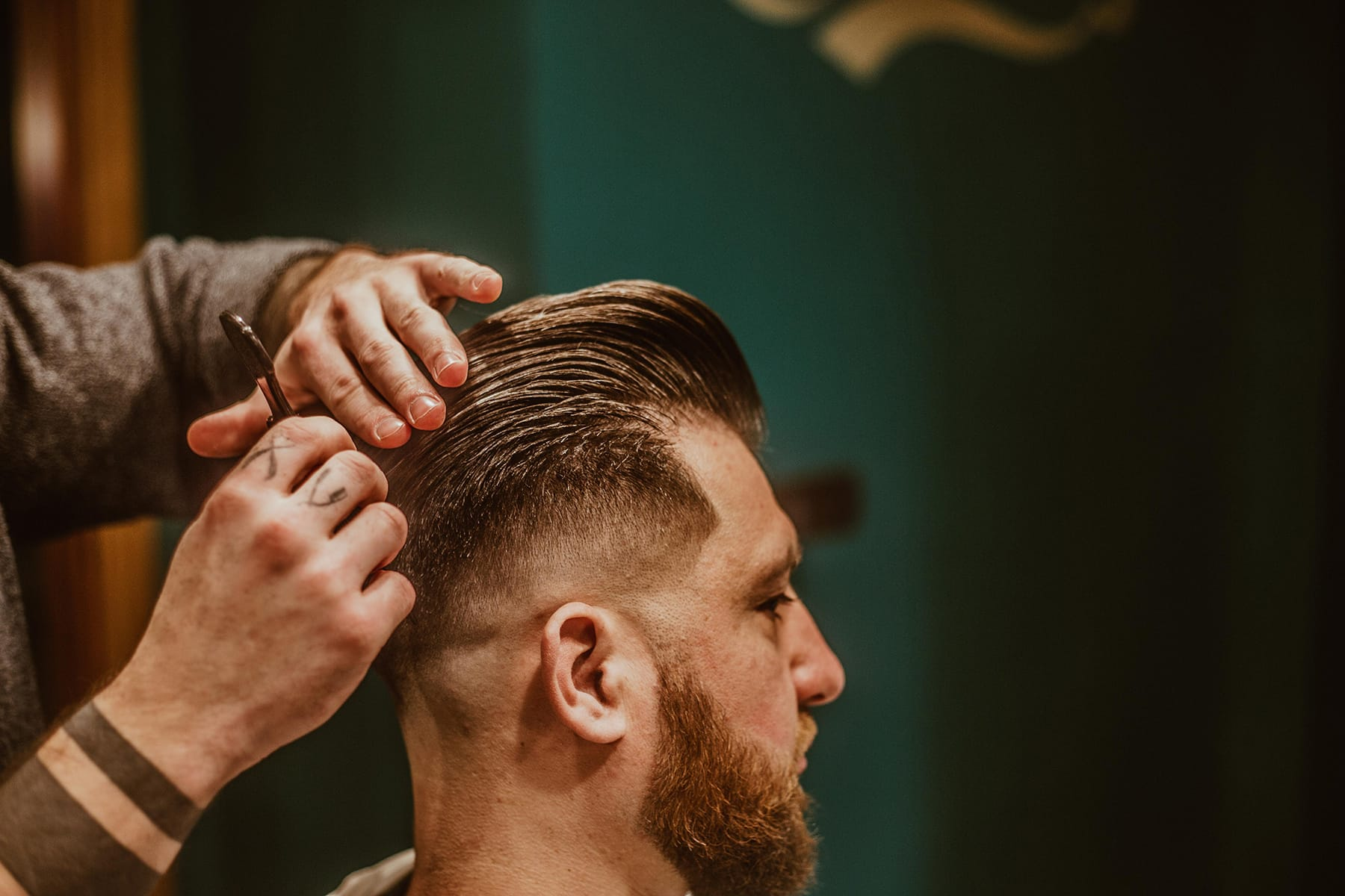 <p><span data-name="clock4" data-type="emoji">🕓</span> <strong>Word:</strong><br><strong>beim Friseur</strong> is a prepositional phrase meaning <strong>“at the hairdresser’s”</strong> or <strong>“at the barber’s.”</strong> It’s a contraction of <strong>bei dem Friseur</strong>.</p><p><span data-name="high_volume" data-type="emoji">🔊</span> <strong>Pronunciation:</strong><br><strong>[bym fri-ZUR]</strong> — “beim” rhymes with “lime,” and “Friseur” sounds like “free-ZUR” with a French flair.</p><p><span data-name="brain" data-type="emoji">🧠</span> <strong>Memory Trick:</strong><br>"bei" = at, and "Friseur" = hairdresser. Imagine: You’re <em>by</em> the person who styles your hair → <em>beim Friseur</em>. Also, Friseur looks fancy and French — just like a stylish salon.</p><p><span data-name="receipt" data-type="emoji">🧾</span> <strong>In Context:</strong><br>„Lena ist heute beim Friseur.“ — <em>Lena is at the hairdresser today.</em><br>„Ich war gestern beim Friseur und habe mir die Haare schneiden lassen.“ — <em>I was at the hairdresser yesterday and had my hair cut.</em></p>