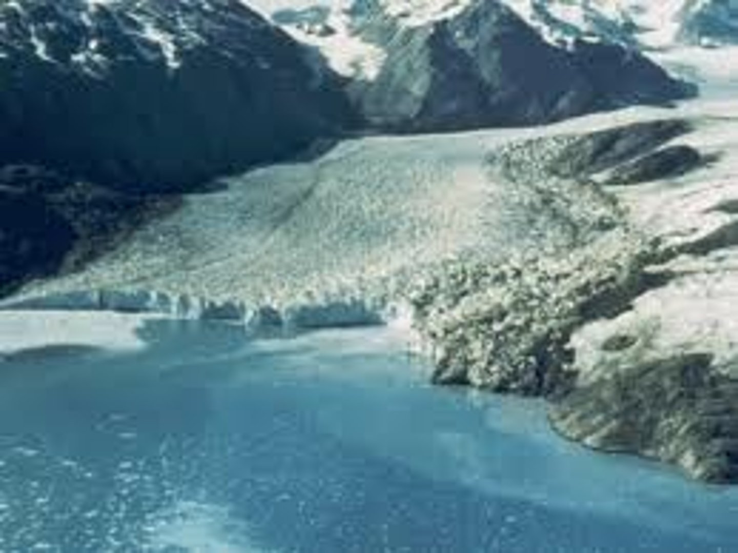 <p>These glaciers are formed on land but terminate in bodies of water. They often calve to produce floating chunks of glacier ice known as icebergs.</p>
