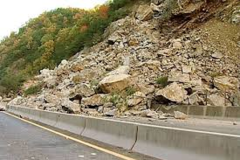 <p>An avalanche of loose rocks, made worse by mechanical weathering (freeze thaw). An example of this was in Burton Bradstock, Dorset Coast in August 2016</p>