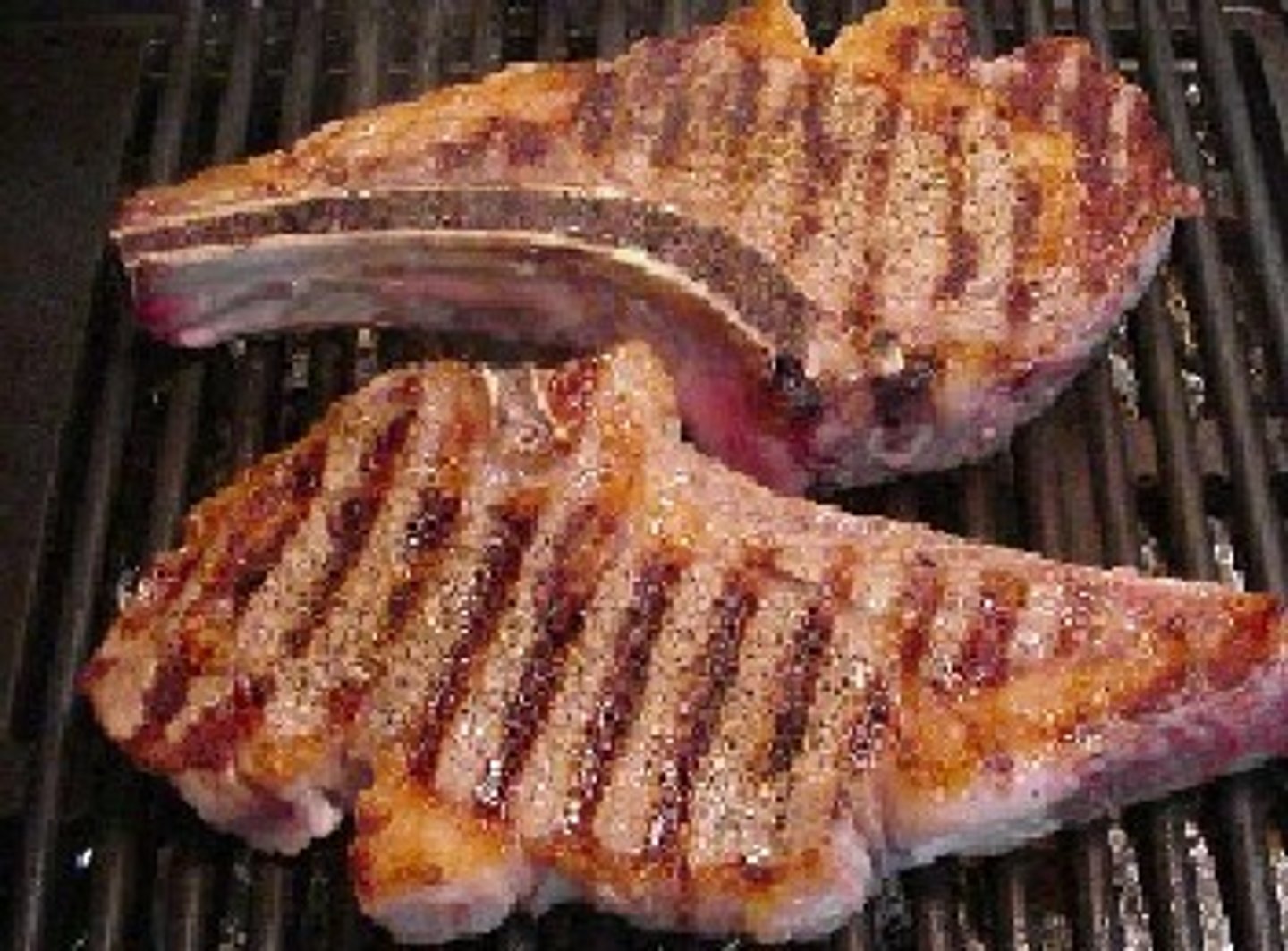 <p>a small cut of meat including part of a rib.</p>