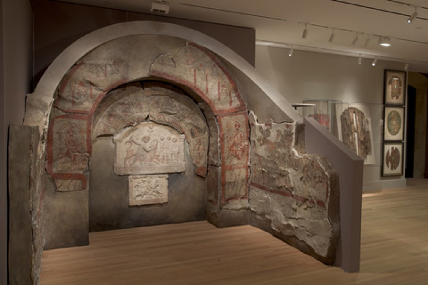 <p>Religion: Mystery cult honoring sun god Mithras</p><p>Structure: Typical Mithraeum form - long room with benches, cult niche with reliefs of Mithras killing bull</p><p>Connection: Likely brought by Roman military</p><p>Artistic Style: Shows Mithras as Palmyrene archer, reflecting local military presence</p>