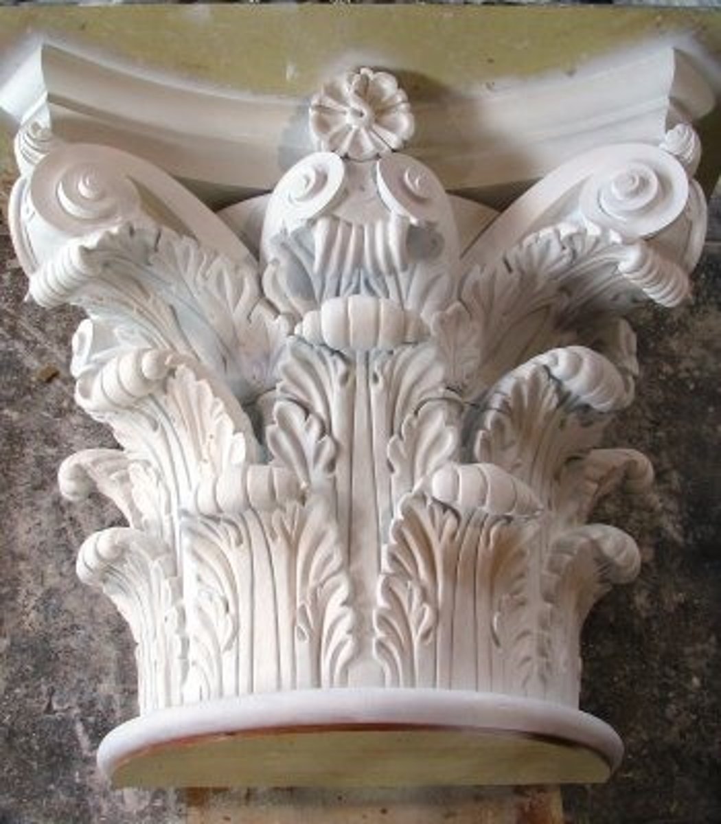 <p>the top of a column (decorative part)</p>