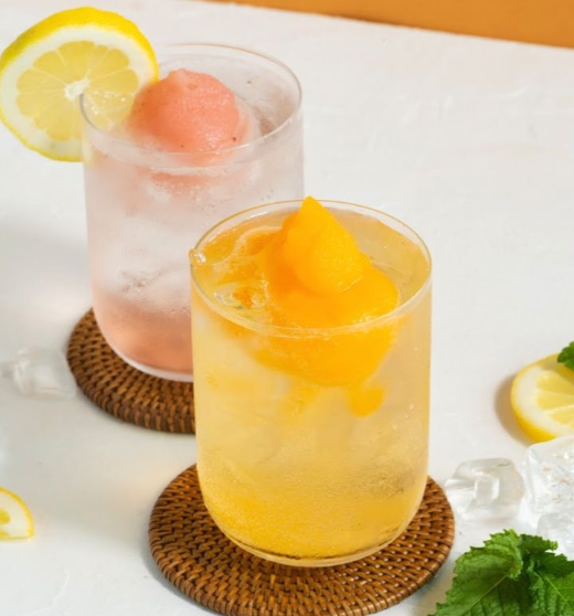 <p>Ingredients: <em>Absolut Mandrin, soda, Bellini slush</em></p><p>Straw: Short </p><p>Tagline: a vodka soda with a splash of bellini slush</p>