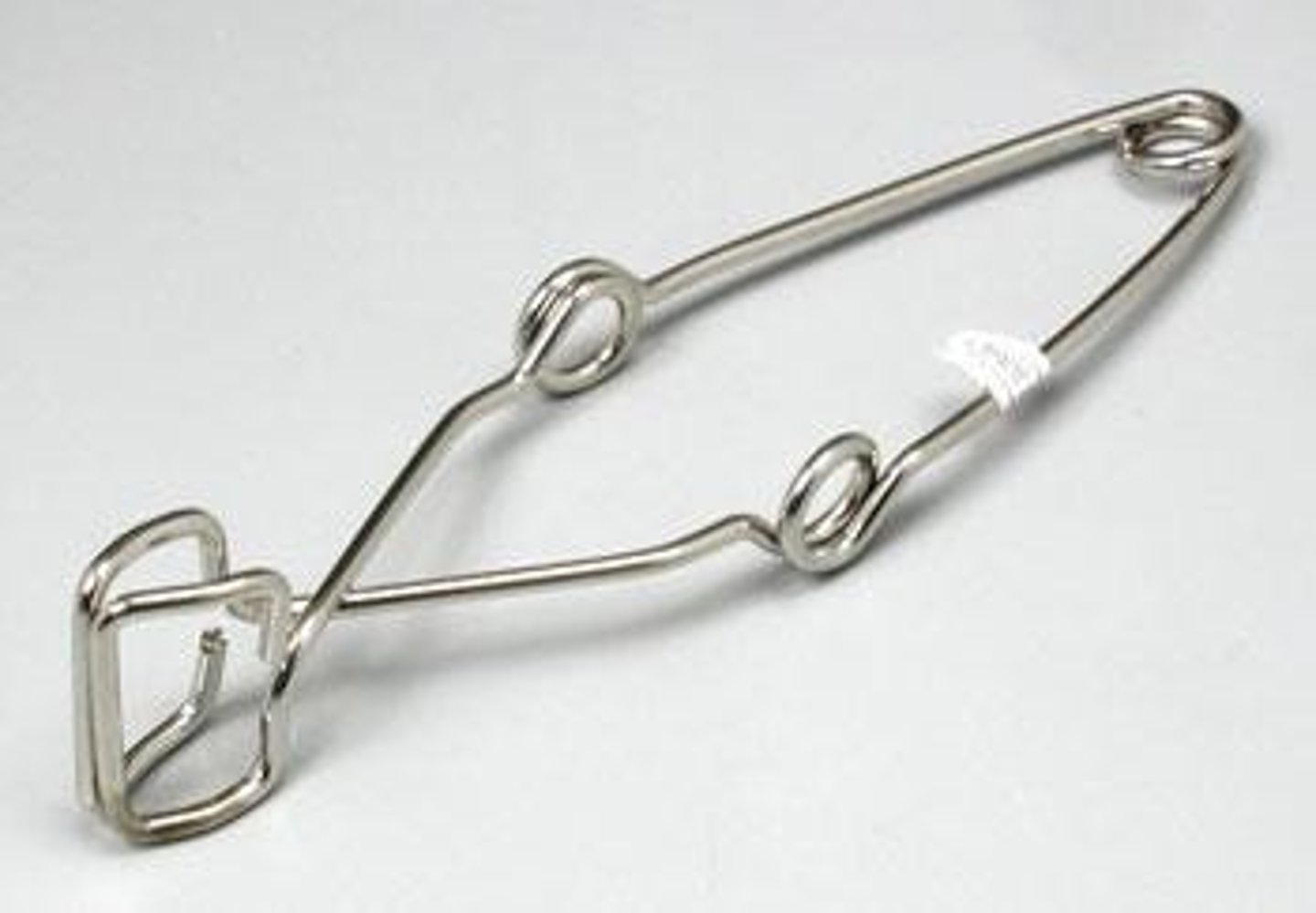 <p>Spring activated metal holder that is used to transport a test tube.</p>