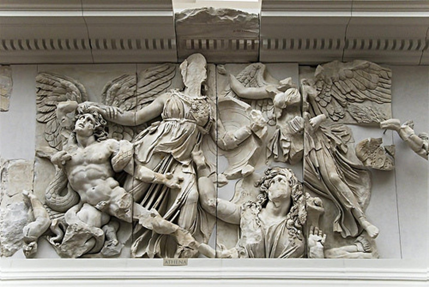 <p>Period: Hellenistic c.175 B.C.E.</p><p>Form: Marble frieze</p><p>Function: Narrative; Altar of Zeus</p><p>Content: Athena battles Alkyoneos. Gigantomachy. Emotional. Violent movement; swirling drapery. Vivid depictions of suffering. Athena grabs Alkyoneos' hair; Nike flies to crown. High relief: dark shadows.</p>