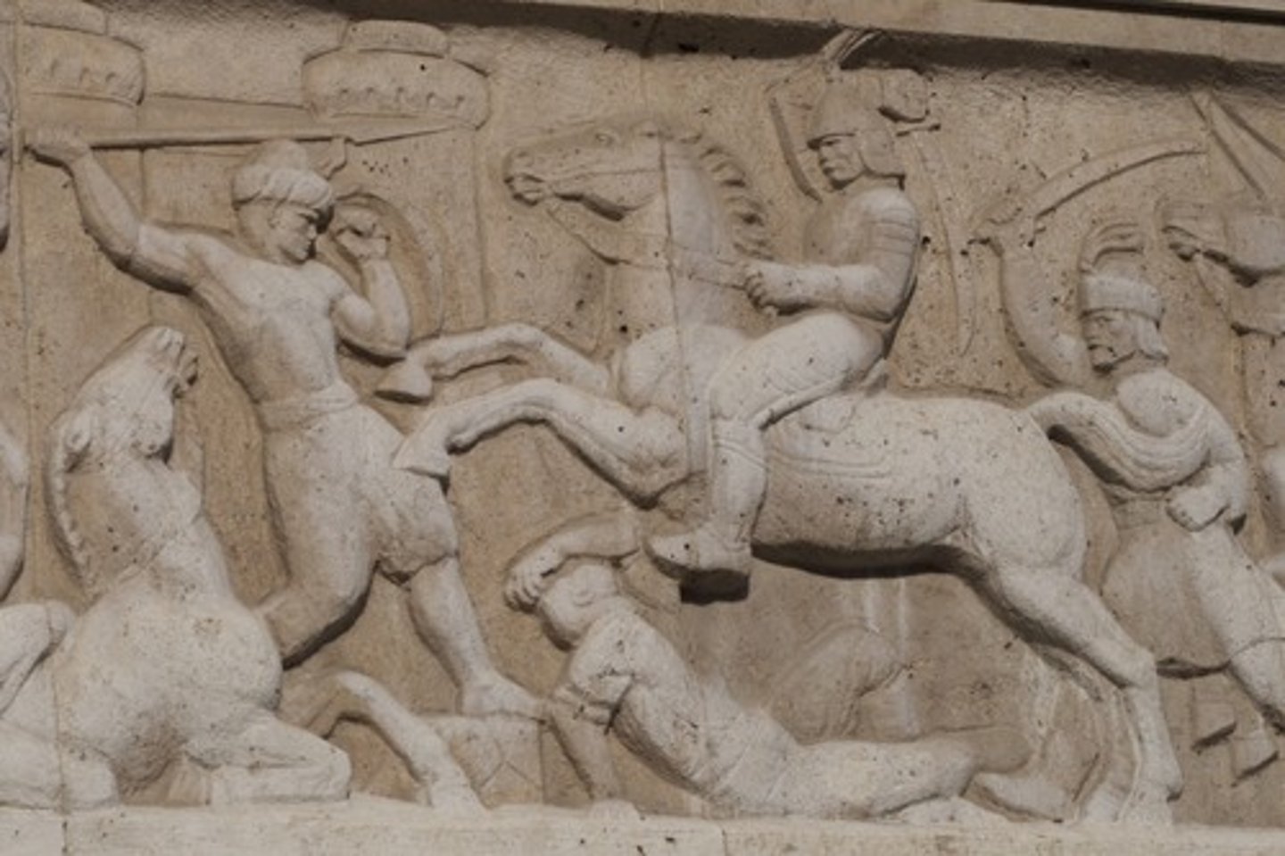 <p>sculpture that projects from a flat background. A very shallow relief sculpture is called a bas-relief (pronounced "bah" relief)</p>