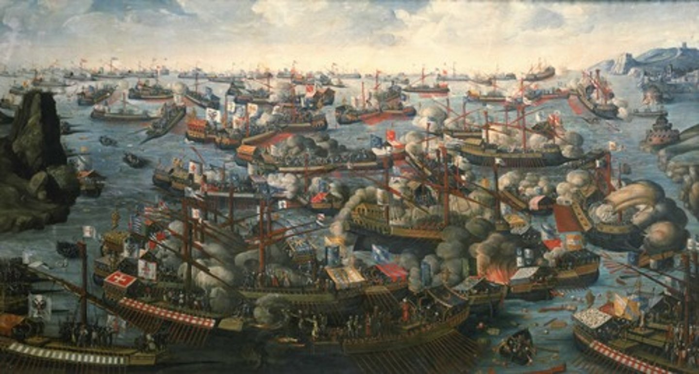 <p>a. Naval battle<br>b. Mediterranean Sea<br>A battle between the Holy League, led by Spain, and the Ottoman Empire in which the League was victorious; The League's victory effectively marked the end of Ottoman expansion.</p>