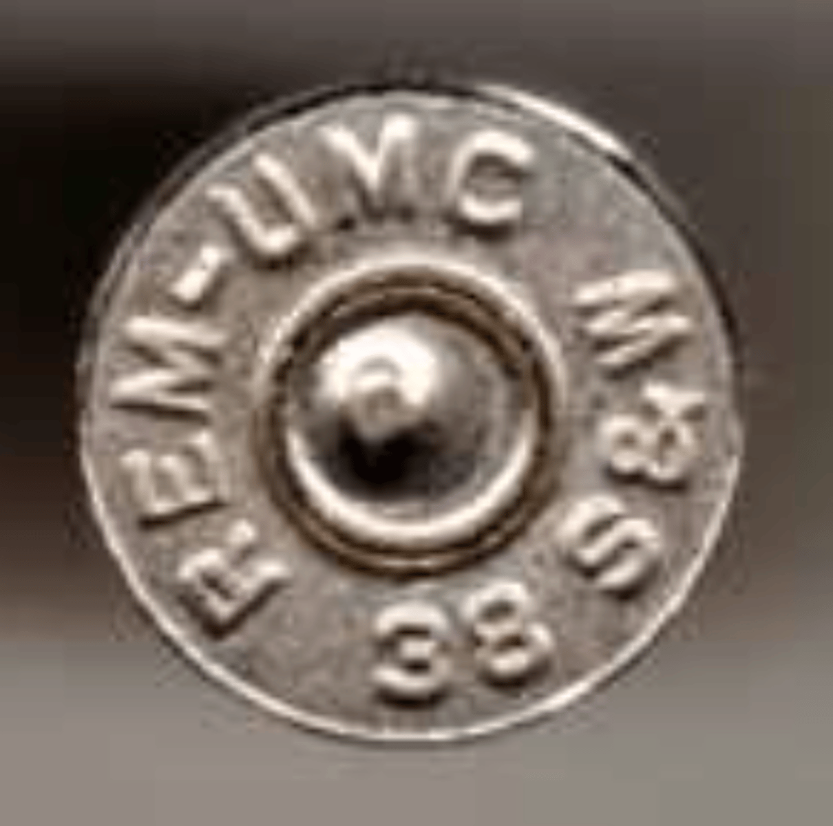 <p>Stamp on the cartridge case with brand, manufacturer, and size (in millimeters)</p>
