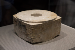 <p>Liangzhu, China, 3,300 BCE, carved with sand and water, subtractive, figurative, stylized, unknown function, circles and squares together, Covered in what looks like facial features.</p>