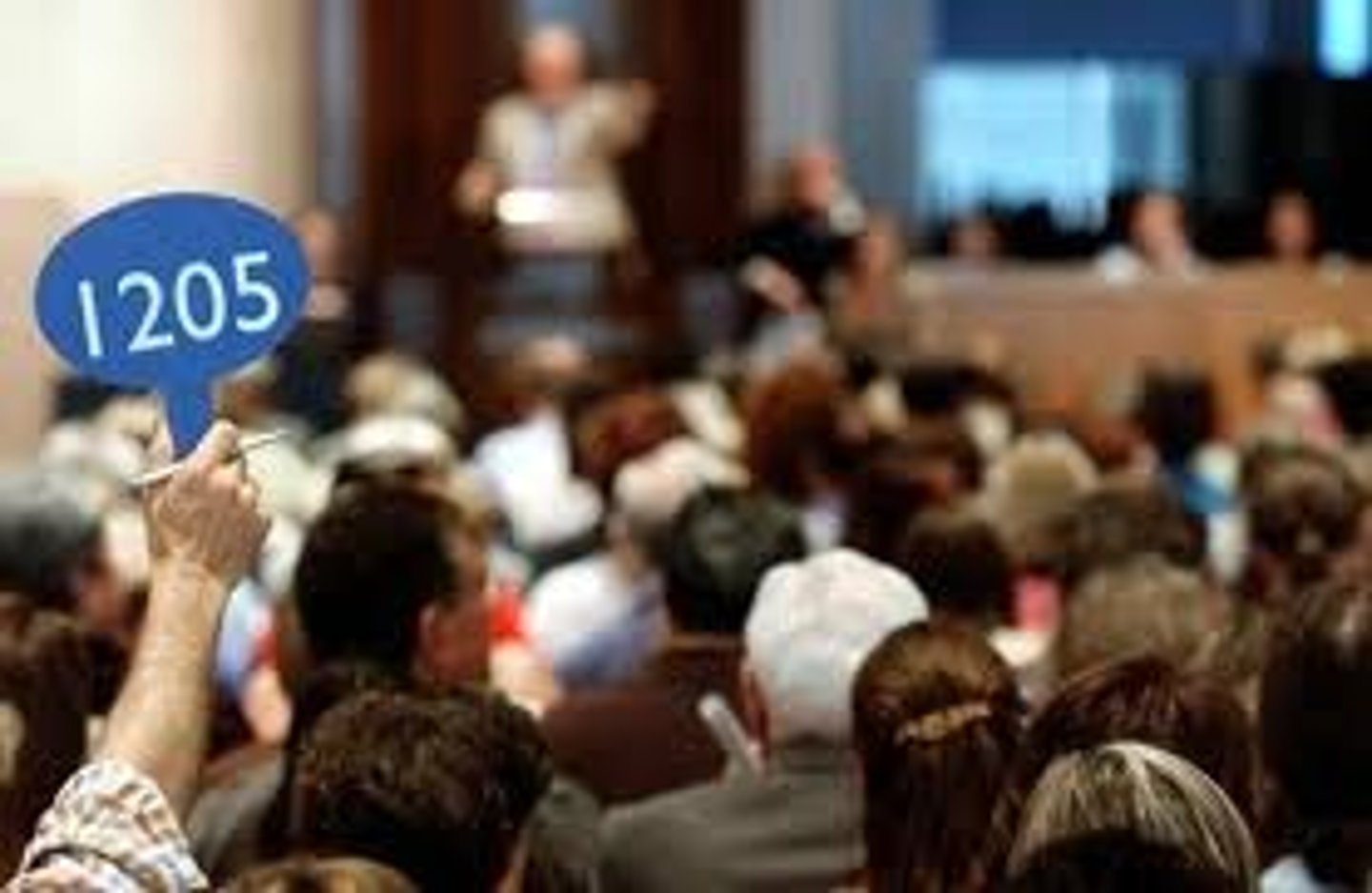 <p>person who makes the offer at an auction</p>
