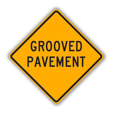 <p>What does Grooved Pavement warn?</p>