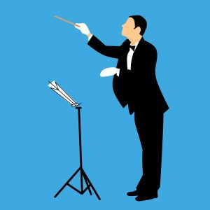 <p>A person who directs an orchestra or choir, ensuring the musicians perform cohesively and interpret the music effectively. </p>