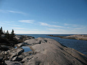 <p><span>a shield is a large area of exposed, ancient, and stable rock, usually part of a continent’s craton (the old, stable interior).</span></p>