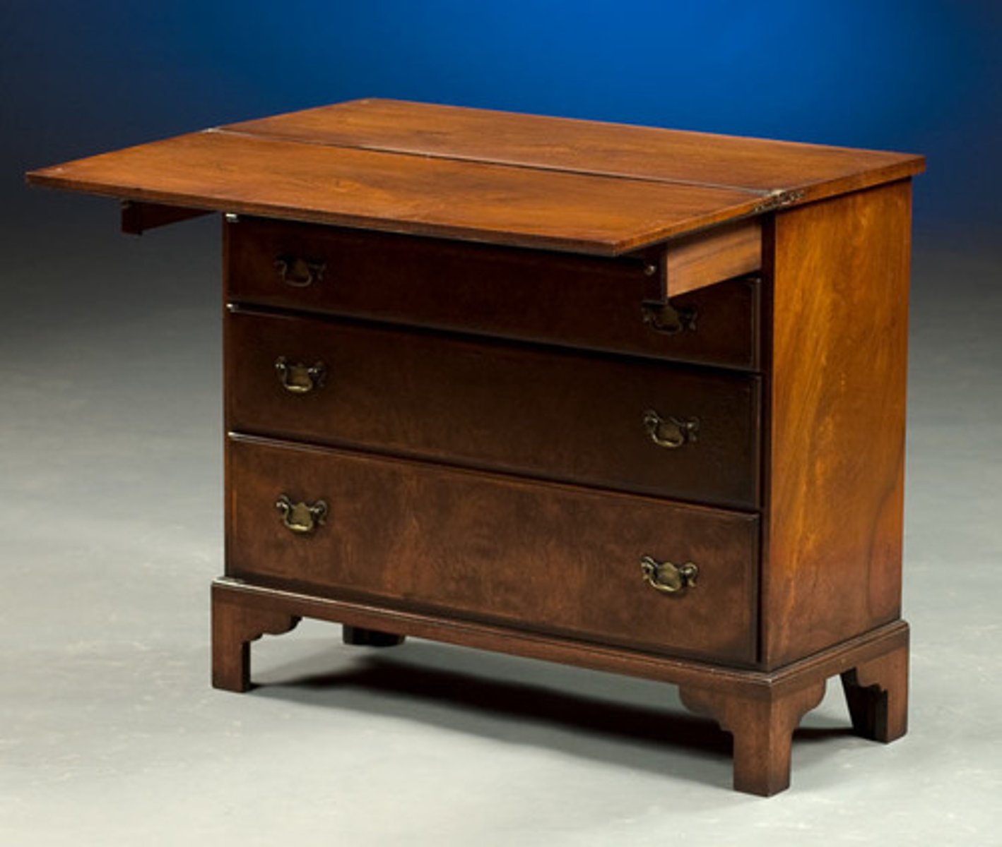 <p>Small, low, wooden cabinet with drawers</p>