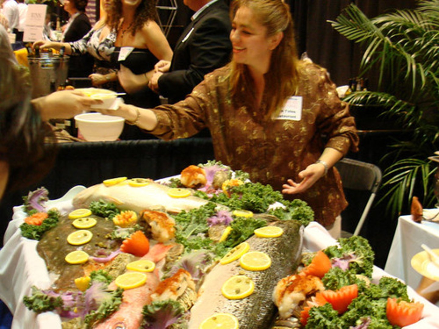 <p>taking pleasure in food and drink</p>
