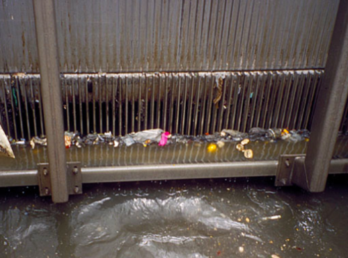 <p>In primary wastewater treatment where water flows through screens to remove large objects from the water</p>