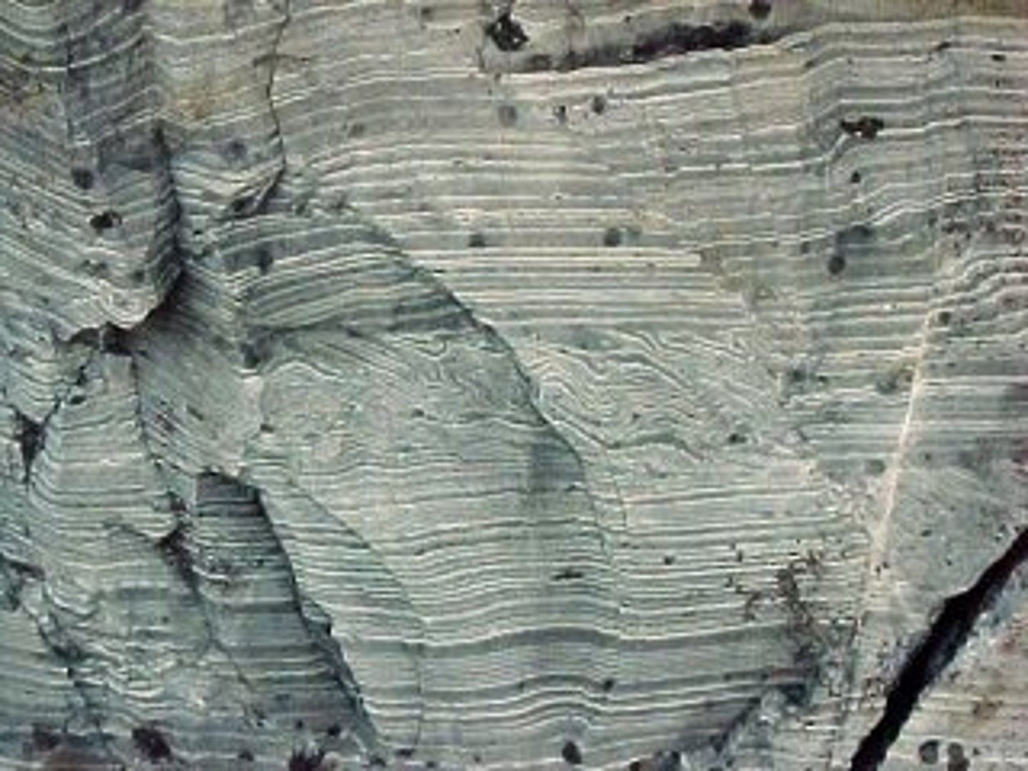 <p>Lake freezes in winter and thaws in summer. Darker=organic-rich, summer</p>