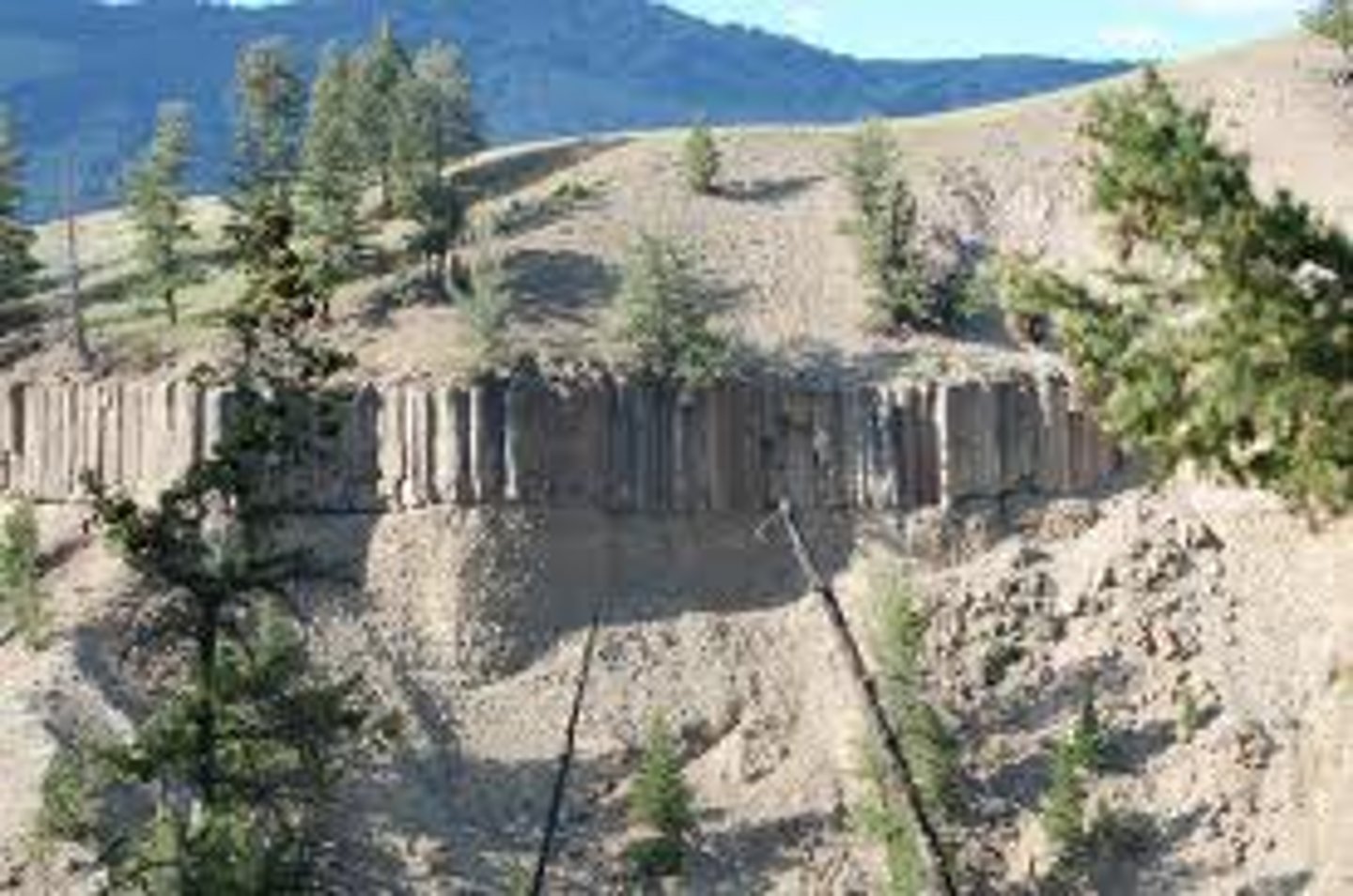 <p>igneous rock feature formed when magma is squeezed into a horizontal crack between layers of rock and hardens underground</p>
