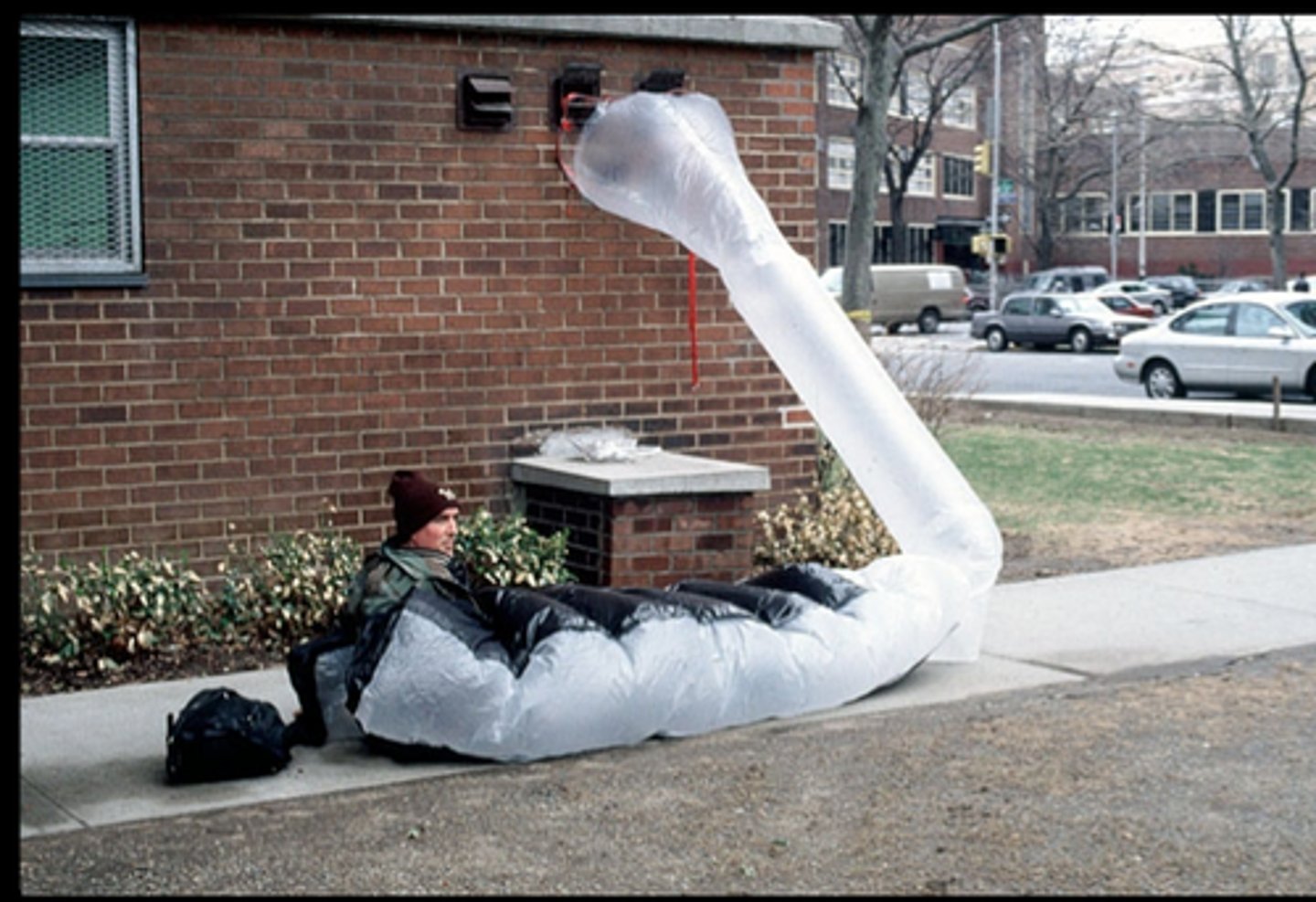 <p>Title: paraSITE Shelter for Michael McGee</p><p>Time: 2000.</p><p>Known for:</p><ul><li><p>Custom shelters for homeless people</p></li><li><p><strong>Empathy meets design</strong>; using inflatable materials - vinyl, nylon</p></li><li><p>Known for his <strong>socially conscious art</strong>, Rakowitz's work critiques <strong>inequality, homelessness</strong>, and the <strong>failure of urban systems</strong> to address the needs of vulnerable populations. It also challenges the idea of <strong>architecture as a tool for exclusion</strong>, showing how art can provide <strong>immediate, practical solutions</strong> to real-world issues.</p></li></ul><p></p>