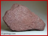 <p><span style="font-size: 12.8px; font-family: lato, sans-serif">a mineral with either a metalic or earthy luster, is grey/brown/red in color, maroon streak, hardness of 6.5, has weak magnetism</span></p>