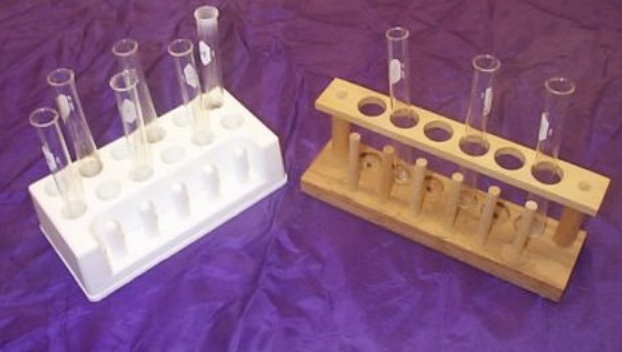 <p>For holding and organizing test tubes on the lab counter. Plastic racks may melt in contact with very hot test tubes</p>