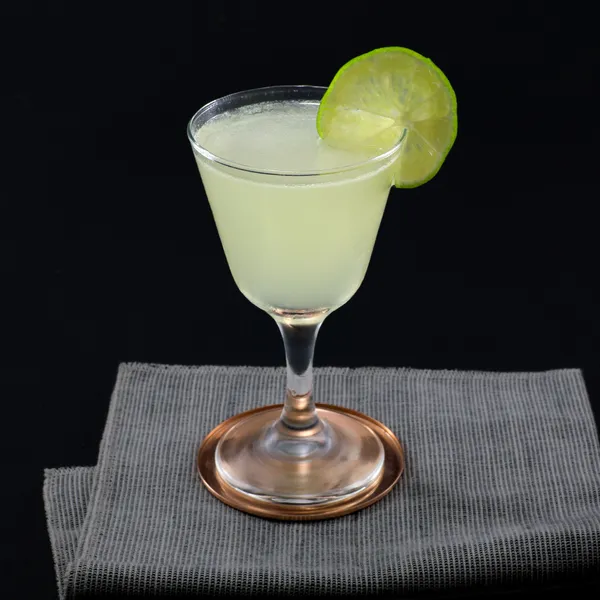 <p>sour, 2 oz gin, 0.75 oz lime juice, 0.75 oz simple syrup, served up or on the rocks, garnished with lime</p>