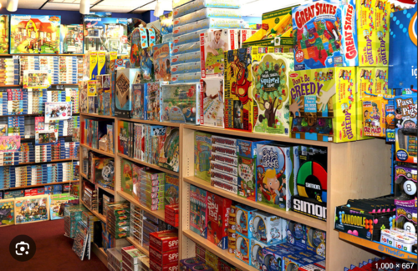 <p>le magasin de jeux et jouets</p>