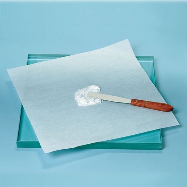 <p>Non-absorbent surface usually made from ground glass. Compound different substances together, usually ointments.</p>