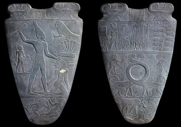 <p>Form:<br>-greywacke<br>-organized in registers<br>-hierarchic scale<br>-low relief, twisted perspective<br>Content:<br>-Front: Narmer (on large scale) looking on the beheaded bodies of his enemies wearing crown of lower Egypt, harnessed lionesses (symbol of unification), bull knowcking down a city fortress (Narmer knocking over enemies)<br>-Back: Hawk=Horus, Narmer wearing bowling pin crown (symbol of unification), stands barefoot (he is a divine king), palette for eye makeup, hieroglyphics<br>Function:<br>-represents the unification of Egypt and country's growth as a powerful nation<br>Context:<br>-found in temple of Horus<br>-Old Kingdom of Egypt<br>-3000 BCE</p>