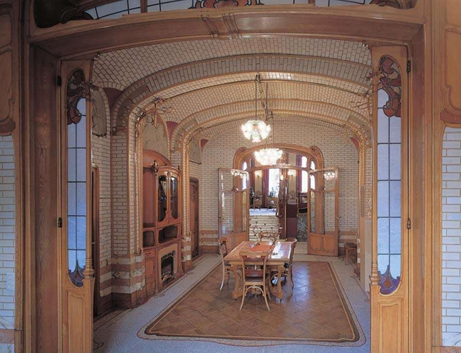 <p>In his own house______________, Victor Horta included tiled walls and ceiling built-in cabinets, woodwork with stained-glass inserts, electric lighting fixtures, and furniture with flowing Art Nouveau curves all to his own design. The white tiles and the use of color are typical of Art Nouveau style. </p>