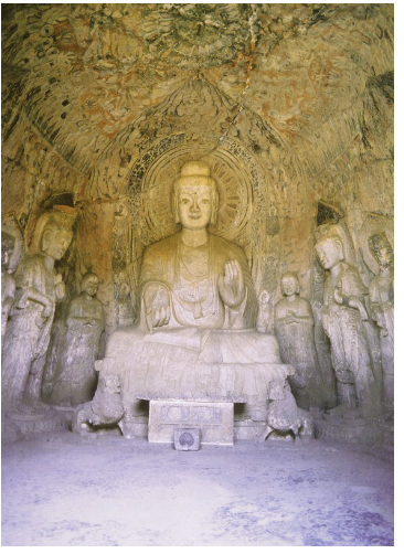 <p><span><span>A buddha with attendants (back wall of cave 140)</span></span></p>