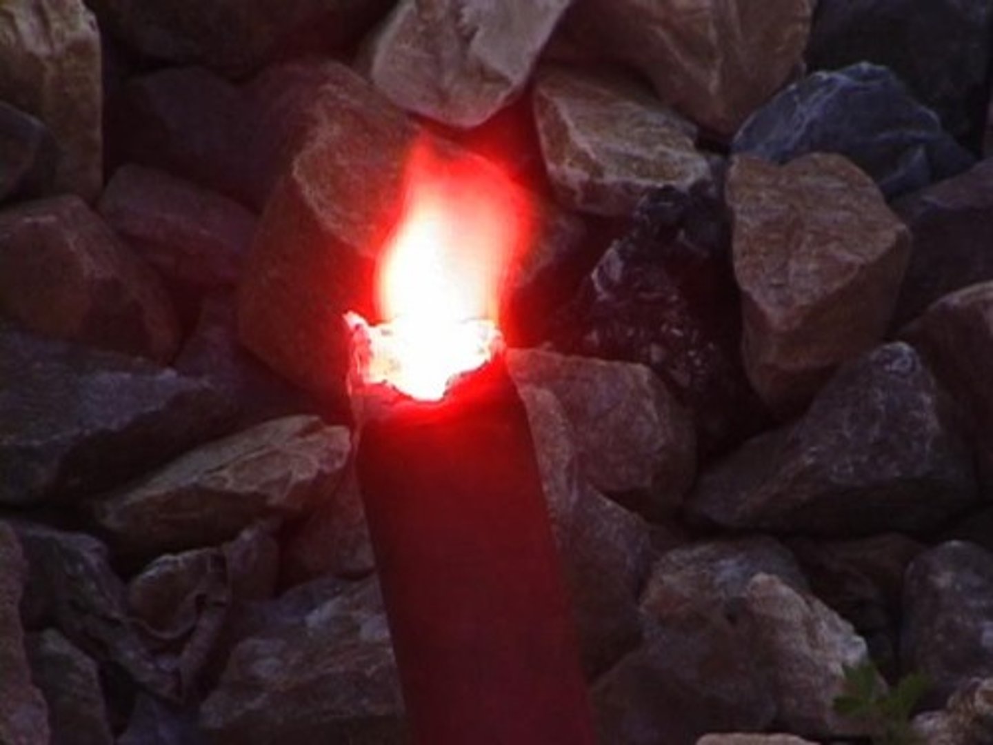 <p>involves a substance reacting with oxygen quickly to produce light and heat (chemical prop)</p>