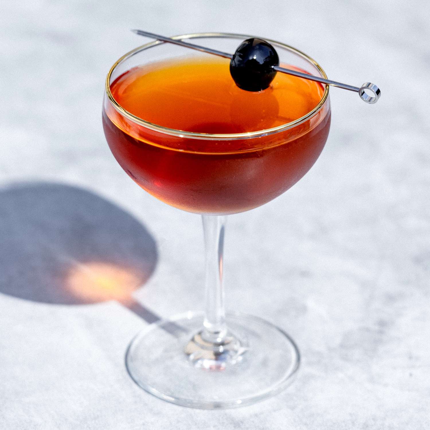 <p>manhattan, 2 oz rye or bourbon, 1 oz sweet vermouth, 2 dash angostura bitters, served straight up, garnished with cherry</p>