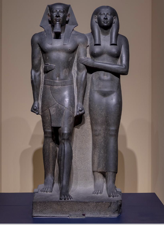 <ul><li><p>Giza</p></li><li><p>Old Kingdom Egypt</p></li><li><p>made of Greywacke (hard, dark, dirty stone)</p></li><li><p>both stepping forward</p></li><li><p>royal authority</p></li><li><p>humanization</p></li></ul><p></p>