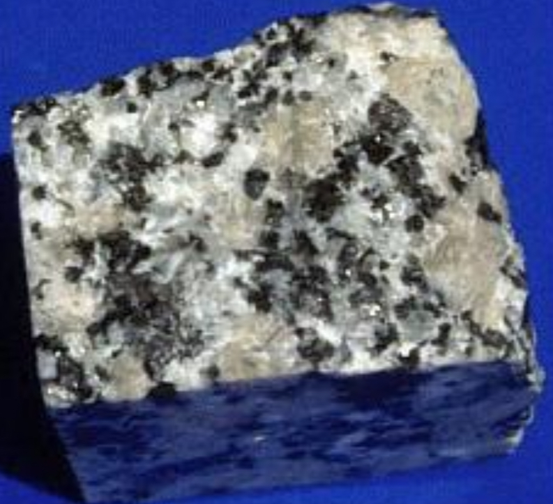 <p>TEXTURES</p><ul><li><p><strong>COARSE GRAINED</strong></p></li><li><p><strong>FORMING LARGE INTERLOCKING CRYSTALS</strong></p></li></ul><p></p>