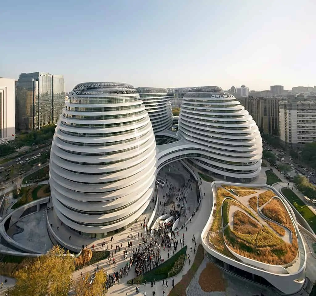 <p>a retail, office, and entertainment complex in Beijing, comprises four spherical structures clad in aluminum and stone that are bound together by pedestrian bridges.</p>